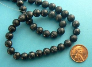 Desert Sun Beads Round 8mm Strand Black / Silver
