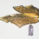 Trifari Gold Tone Solid and Filigree Ribbon Brooch BRO2071