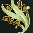 Gerry's Orange Cabochon and Gold Tone Brooch Bro2115