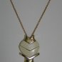 White and Gold Tone Sectional Fish Necklace Nec2094