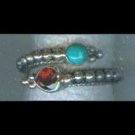 Sterling silver adjustable ring with garnet and turquoise stones