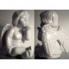 Ceramic white angel / cherub blowing kiss