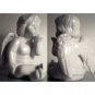 Ceramic white angel / cherub blowing kiss
