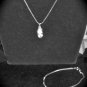 I baby shoe pendant .925 w/white crystal stones & 30 Inch serpentine Chain