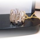 Columns of white and champagne diamonds.  Big presence.  18k right hand ring