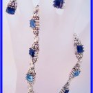 Princess cut blues and silvertone cable designer style earrings and power necklace