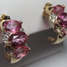 Faux pink sapphire / diamond earrings.  Heiress style.  Believable