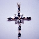 Blue marquise cut sapphire cross pendant.  1.25"