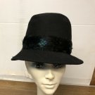 VINTAGE LADIES #96 HAT BLACK WITH 1 1/2' BLK RIBBON & FRONT 1/2 FEATHER 21 1/2" VINTAGE LADIES #96 HAT BLACK WITH 1 1/2' BLK RIBBON & FRONT 1/2 FEATHER 21 1/2"