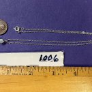 18" SILVER TONE NECKLACE WITH A LIGHT BLUE STONE #1006 18" SILVER TONE NECKLACE WITH A LIGHT BLUE STONE #1006
