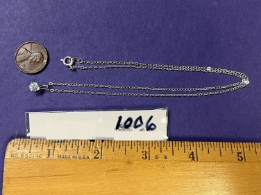 18" SILVER TONE NECKLACE WITH A LIGHT BLUE STONE #1006
