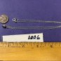 18" SILVER TONE NECKLACE WITH A LIGHT BLUE STONE #1006