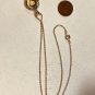 NECKLACE 18" GOLD TONE CHAIN WITH 3/4" ROUND MEDAL WITH FEMALE FIGURE #1005