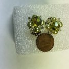 EARRINGS .75 X 1 IN. W PEARLS AND 1 LARGER STONE CENTERED CLIP ON 8010