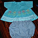 Blue Swing Top with Spring Flowers & free bottoms 24Mths