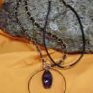 Amethyst pendant necklace on leather cord