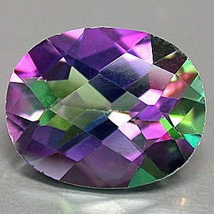 28 Carat Green Mystic Fire Topaz Oval cut gem 25x18mm