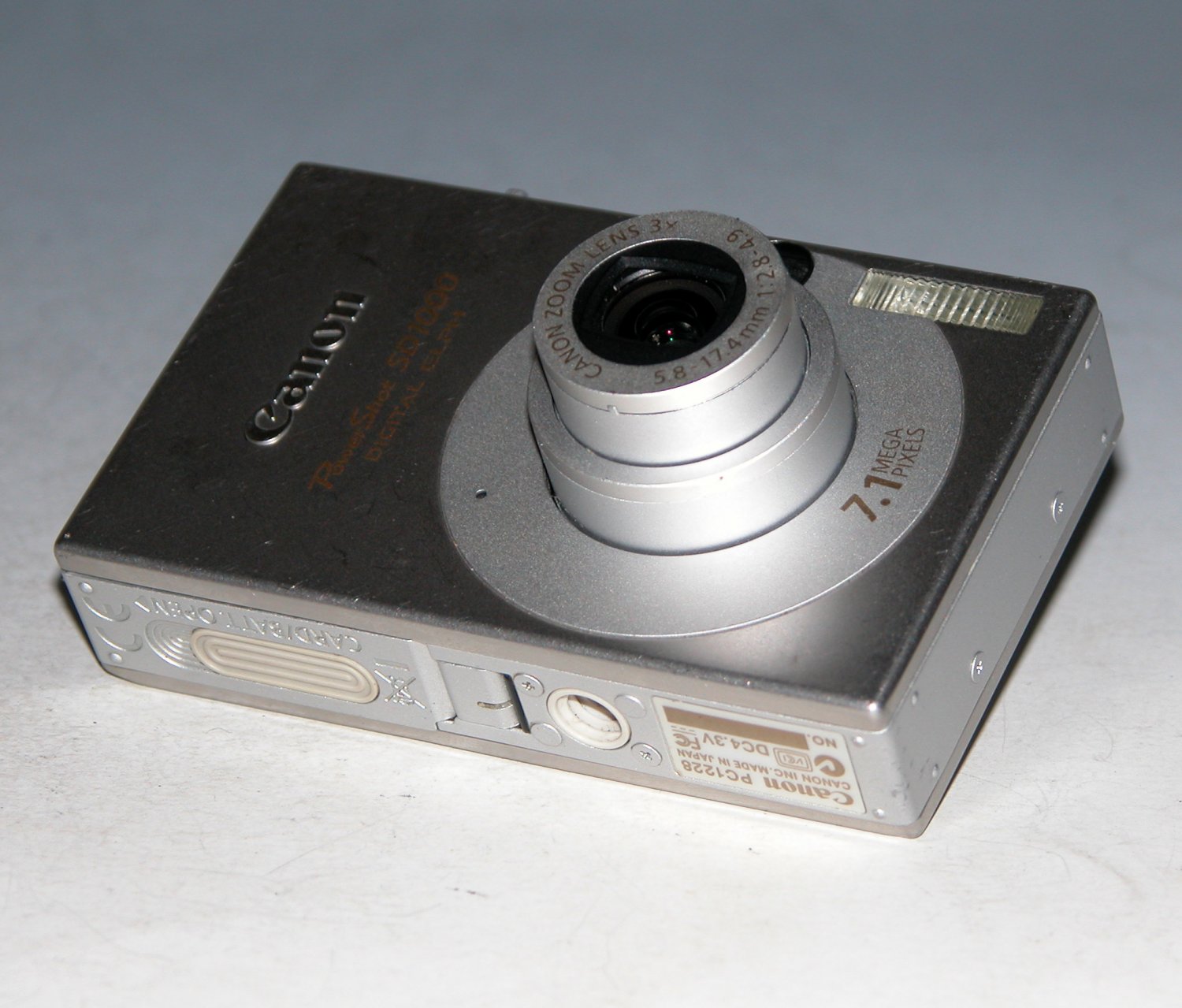 Canon PowerShot Digital ELPH SD1000 7.1MP Digital Camera NS2