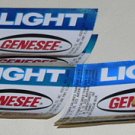 A DOZEN older GENESEE LIGHT BEER BOTTLE LABELS