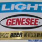 A DOZEN older GENESEE LIGHT BEER BOTTLE LABELS