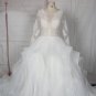 Style 95024-1 Sheer long sleeve lace bridal gowns with large ball gown skirt from Darius Cordell