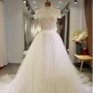 Style #VNDM629 - Modest short sleeve ball gown wedding dress from Darius Cordell