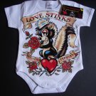 NEW WHITE SHORT SLEEVE ONESIE OR TODDLER TEE OF A SKUNK "LOVE STINKS"