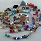 necklace with looks mostly glass beads that needs to be re-strung