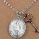 Oval Antiqued silver finish LOCKET necklace with copper tone key
