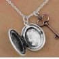 Oval Antiqued silver finish LOCKET necklace with copper tone key