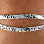 Silver Tone Stretch Criss Cross Bracelet Says "Expect Miracles"
