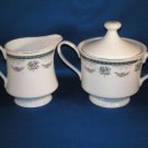 FLORAL CREAMER AND COVERED SUGAR BOWL AS SHOWN