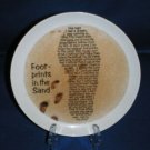 COLLECTOR PLATE FOOTPRINTS IN THE SAND