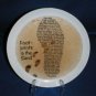 COLLECTOR PLATE FOOTPRINTS IN THE SAND