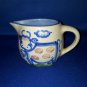 SMALL SINGLE COW CREAMER PITCHER AS SHOWN POTTERY