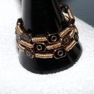 Gold and Black Triple Strand Bracelet