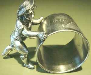 Ca 1886-87 Meriden Silver Figural Napkin Ring Boy Pushing Ring