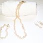 ST312 Rose Quartz Necklace, Earrings and Bracelet Set in Sterling Silver
