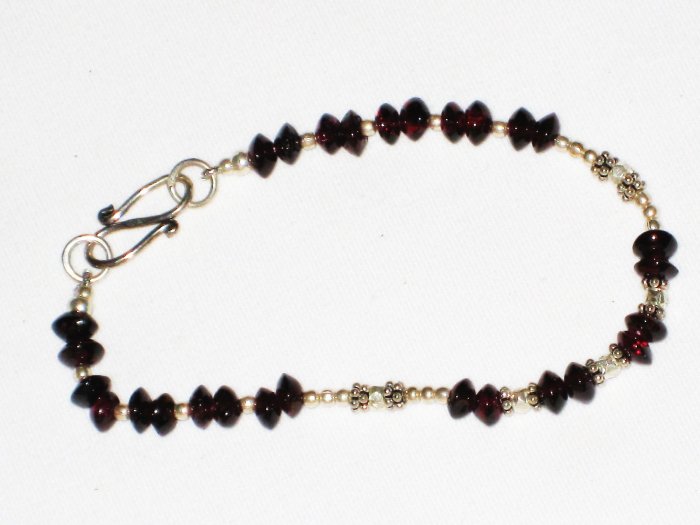 ST570 Garnet Bracelet in Sterling Silver