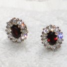 ER077       Ruby Studs Surrounded by CZ in Sterling Silver