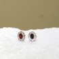 ER077 Ruby Studs Surrounded by CZ in Sterling Silver