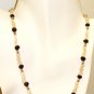 NK007       Rose Quartz and Garnet Necklace with a Green Onyx center. Sterling Silver