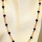 NK007       Rose Quartz and Garnet Necklace with a Green Onyx center. Sterling Silver