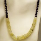 NK009       Moonstone Necklace with a Garnet Strand. Sterling Silver Clasp.