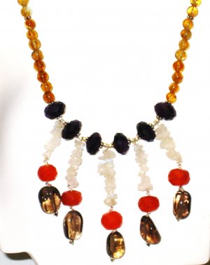 NK011       Citrine strand with Amethyst, Carnelian, Moonstone, and Smoky Quartz Center.