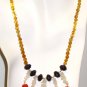 NK011 Citrine strand with Amethyst, Carnelian, Moonstone, and Smoky Quartz Center.