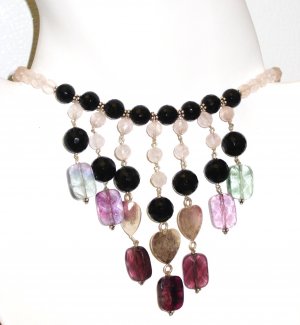 NK015       Multi-Stone Necklace in Sterling Silver with a Rose Quartz Strand.