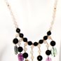 NK015       Multi-Stone Necklace in Sterling Silver with a Rose Quartz Strand.