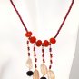 NK028       Onyx, Rose Quartz and Carnelian Necklace in a Garnet Strand.