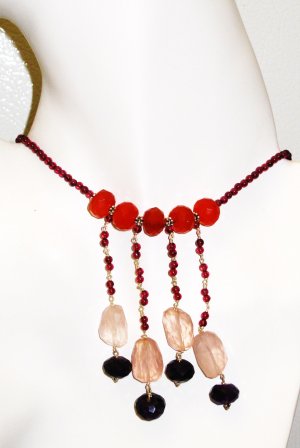NK028       Onyx, Rose Quartz and Carnelian Necklace in a Garnet Strand.